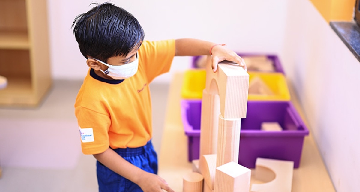 student doing craft activity in a art room
