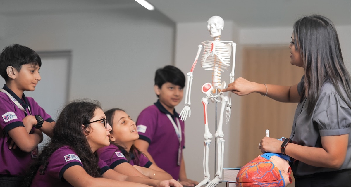 student in science lab at Adani International School