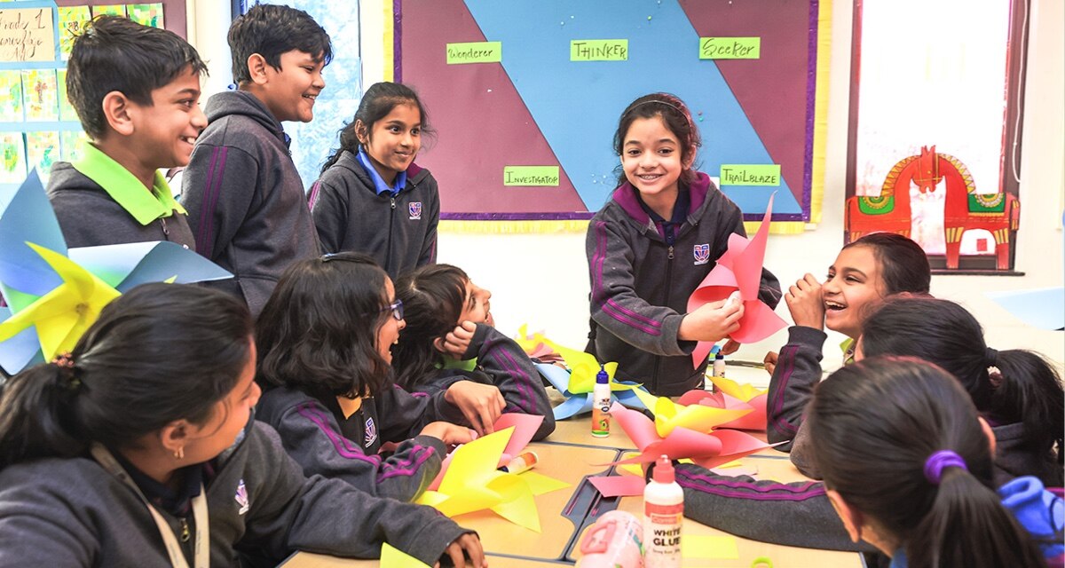 students doing craft activity in a art room