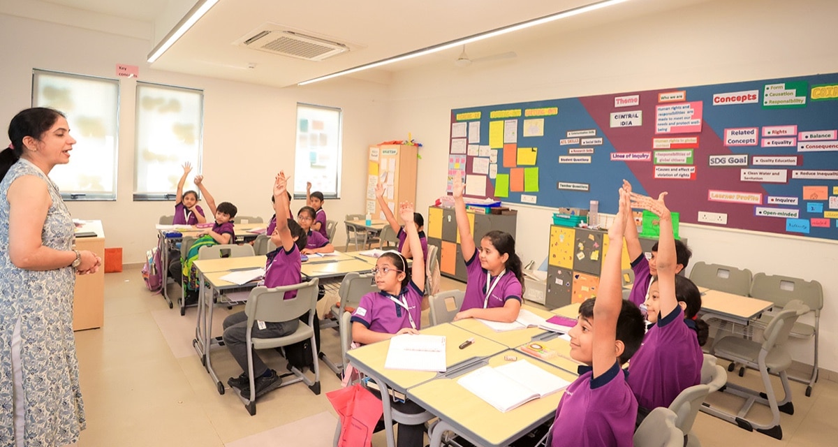 teacher interacting with students in a classroom