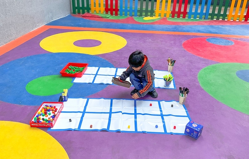 students learning through art activity at Adani International School