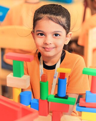 a pre-primary student at Adani International School