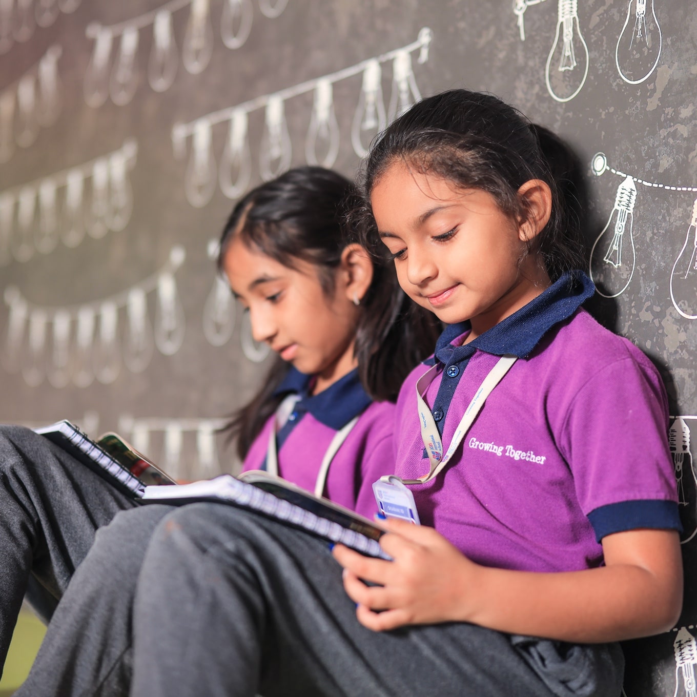 students in a reading room at Adani International School