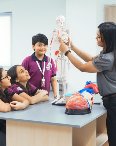 students in a science lab at Adani International School