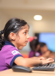 students in a ICT lab at Adani International School