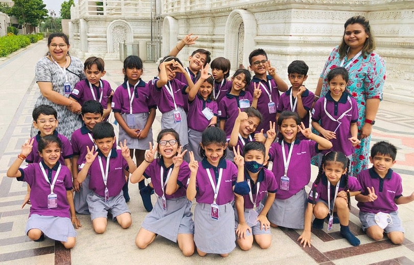 group of students with female teachers