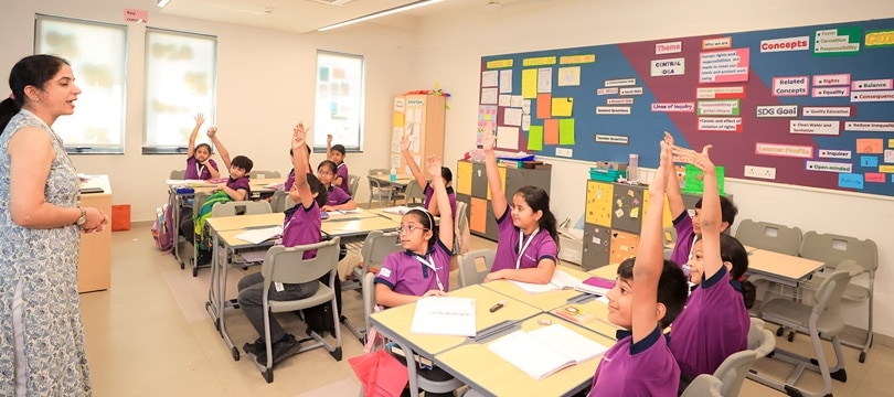 students & teacher in a classroom