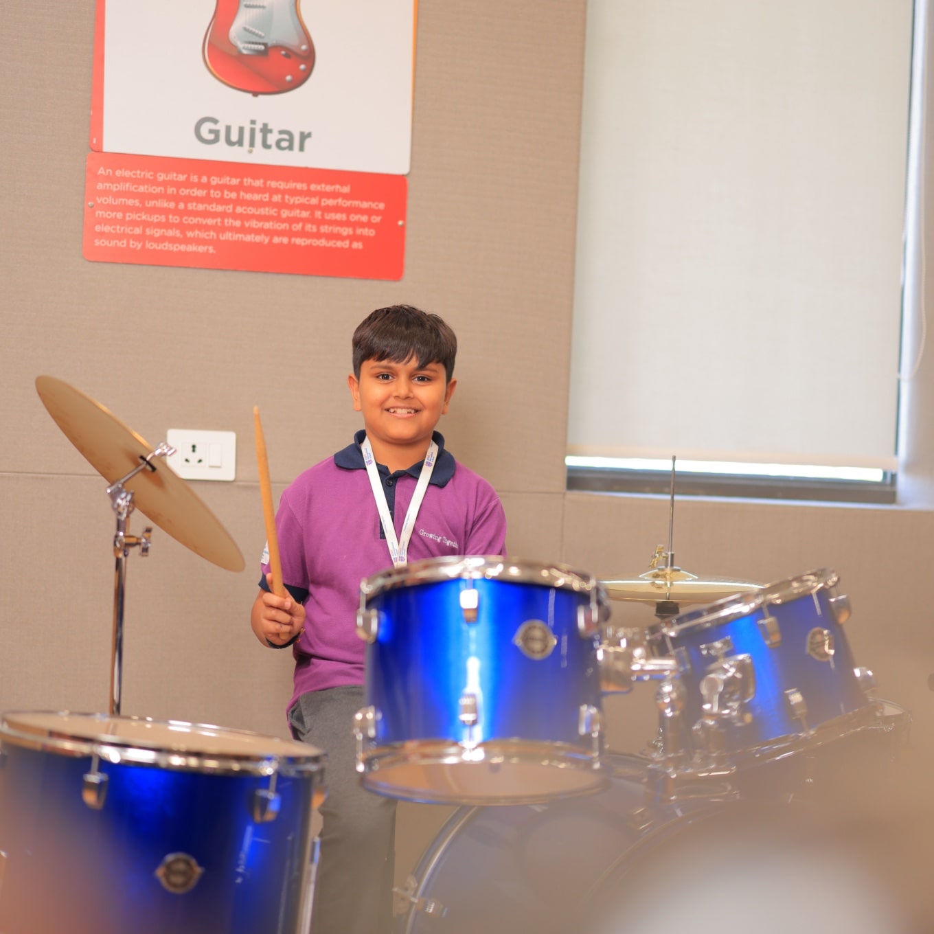 students playing drums at Adani international School