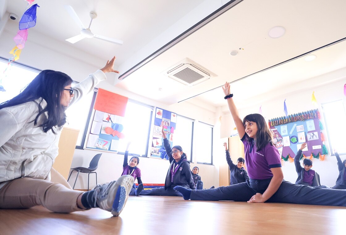 students performing dance at Adani international School