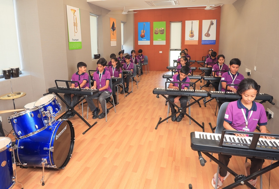 students participating music activity at Adani international School