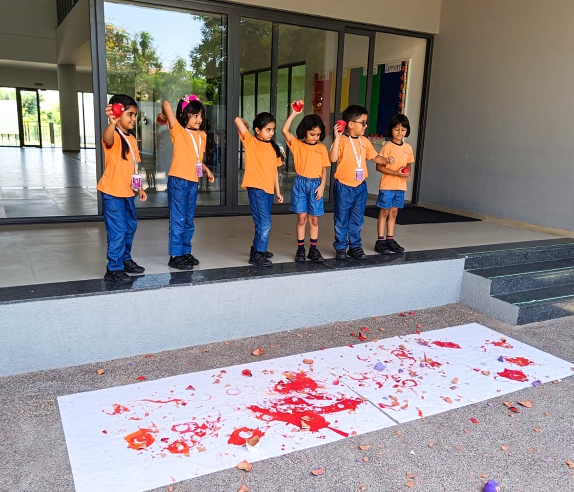students performing sparkling activity at Adani international School