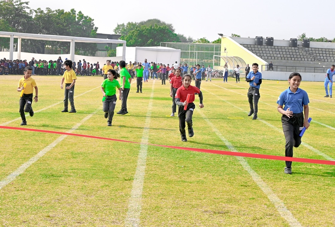 students participating in a race at Adani International School