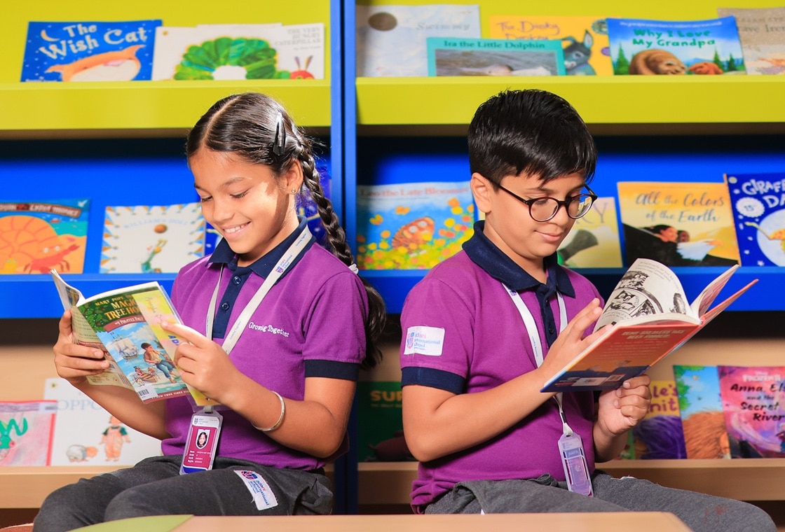 students in library at Adani international School