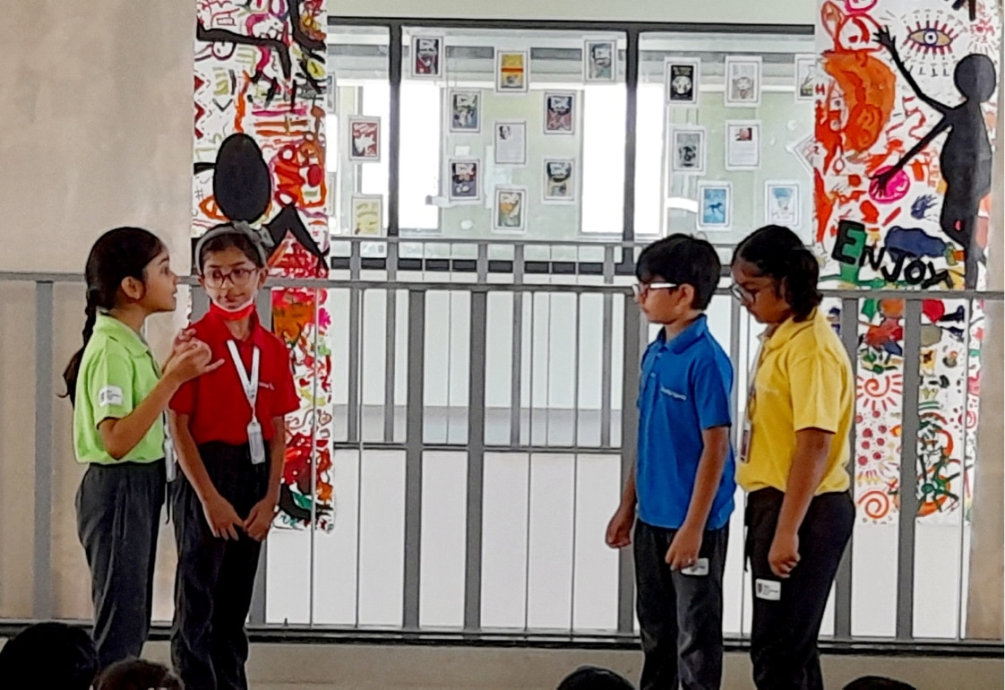 students performing recitation activity at Adani International School