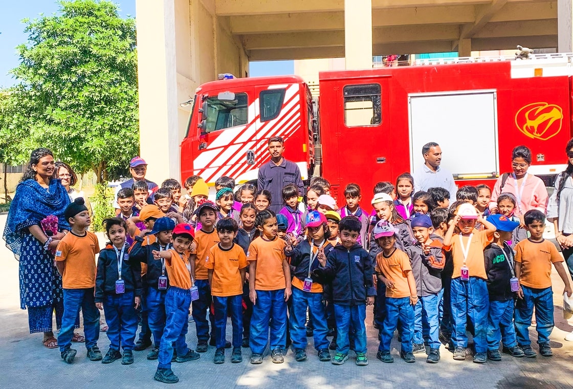 students participating fire-safety drill at Adani International School