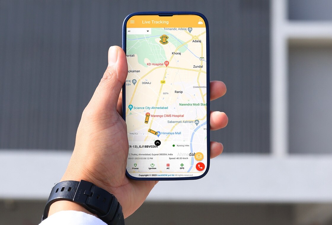 a mobile showing the live tracking details of school bus