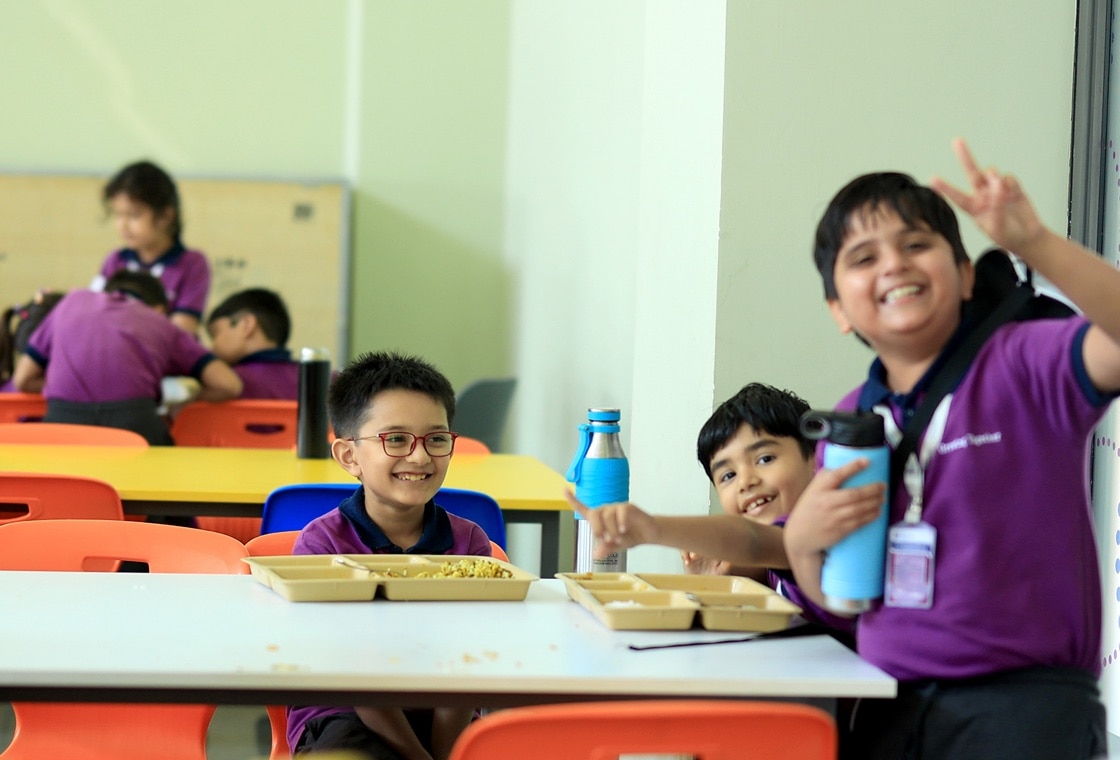 students in dinning hall at Adani International School