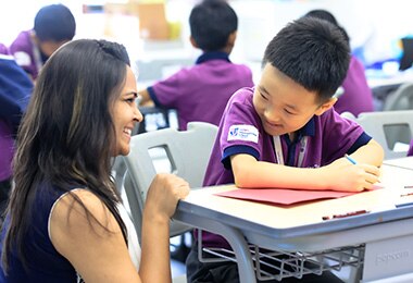 a teacher & student at Adani International School