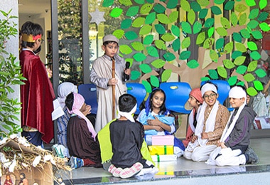 students performing drama at Adani International School