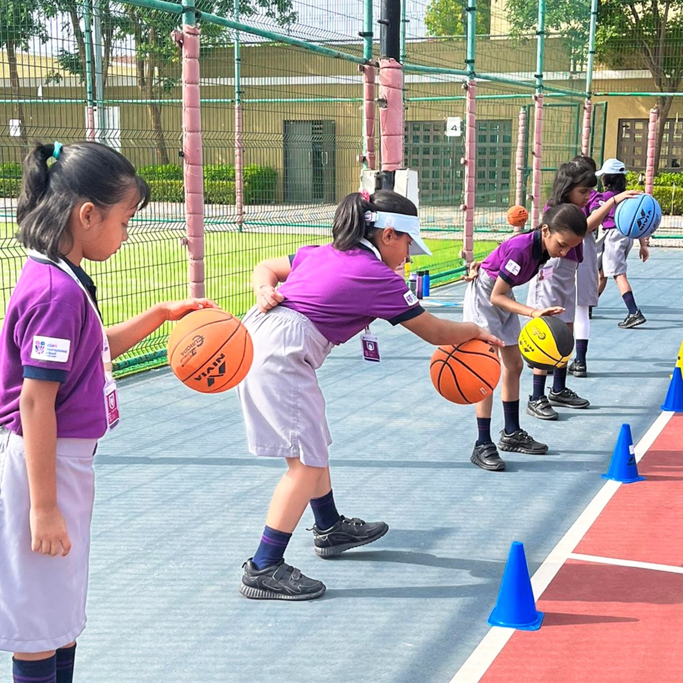 girls playing bollyball at Adani international School