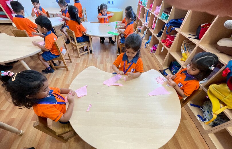 students learning through art activity at Adani International School