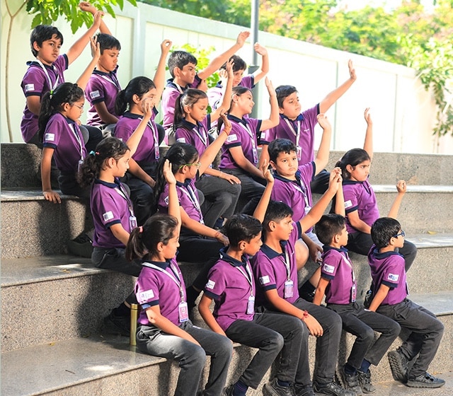 students at amphitheatre at Adani International School
