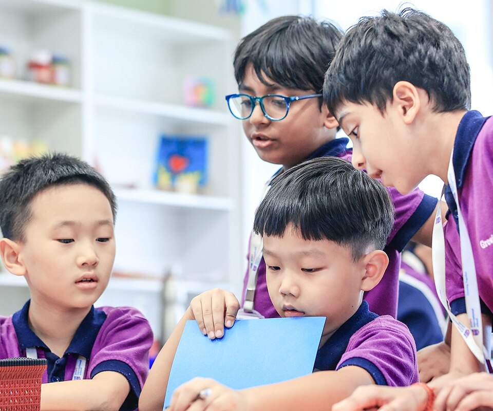 a group of students participating in group discussion at Adani international School